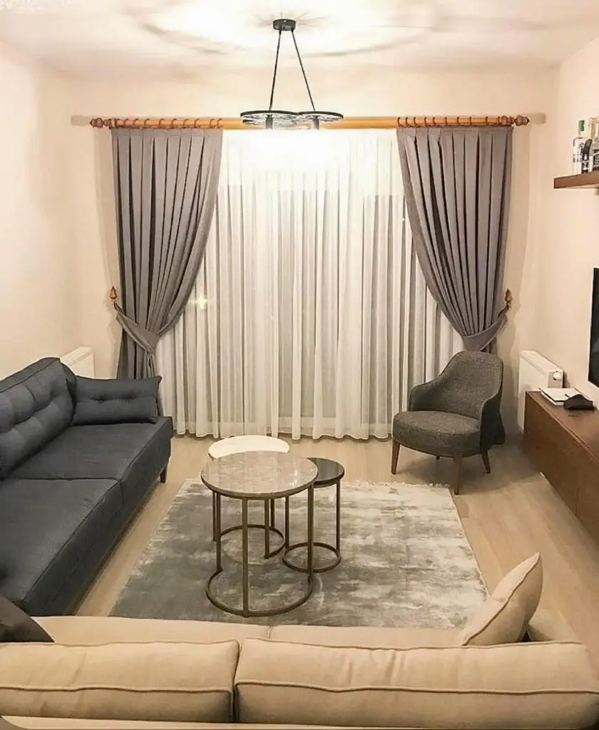 Modern eyelet curtains in linen finish installed in Pune apartment
