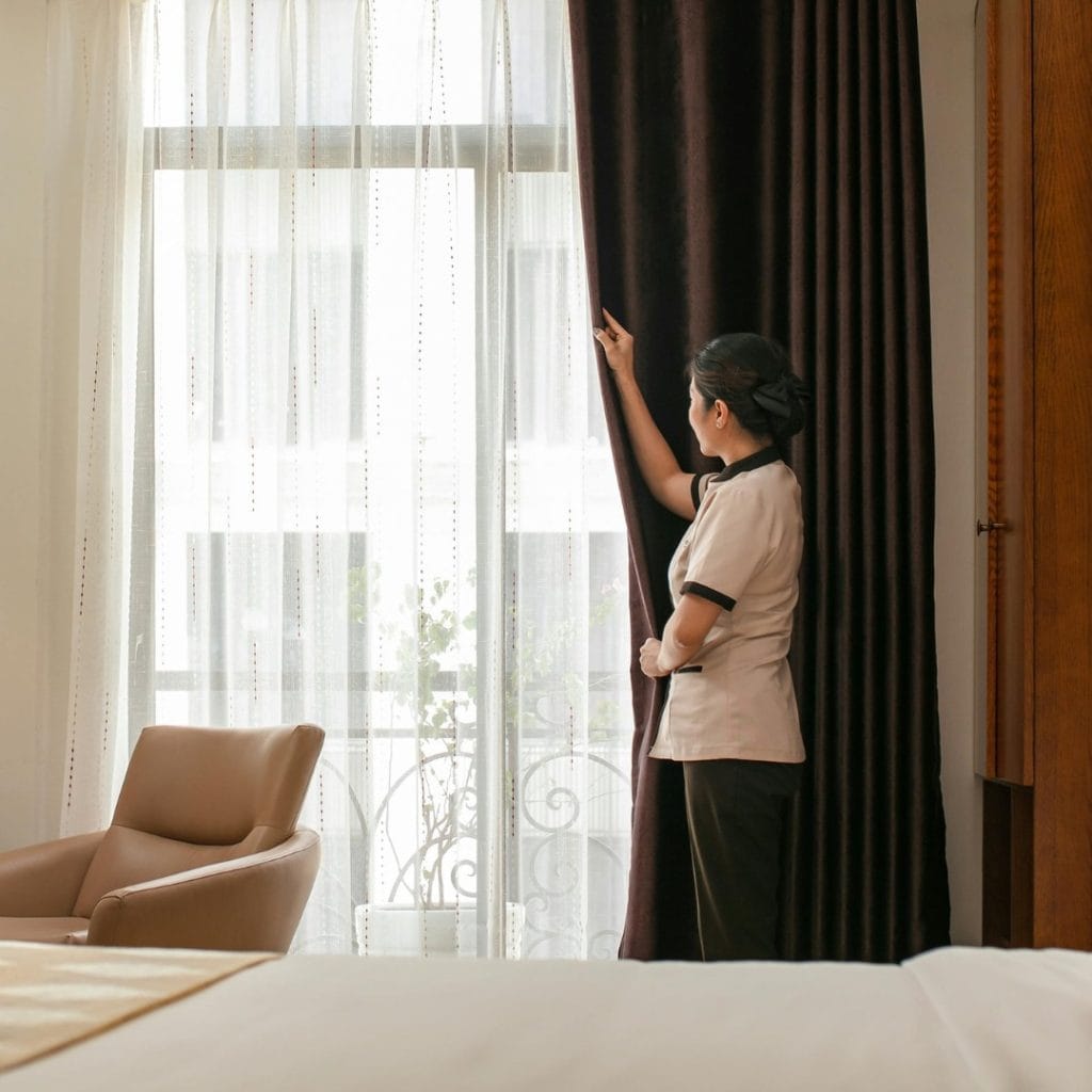 Layered sheer curtains with blackout drapery for bedroom privacy