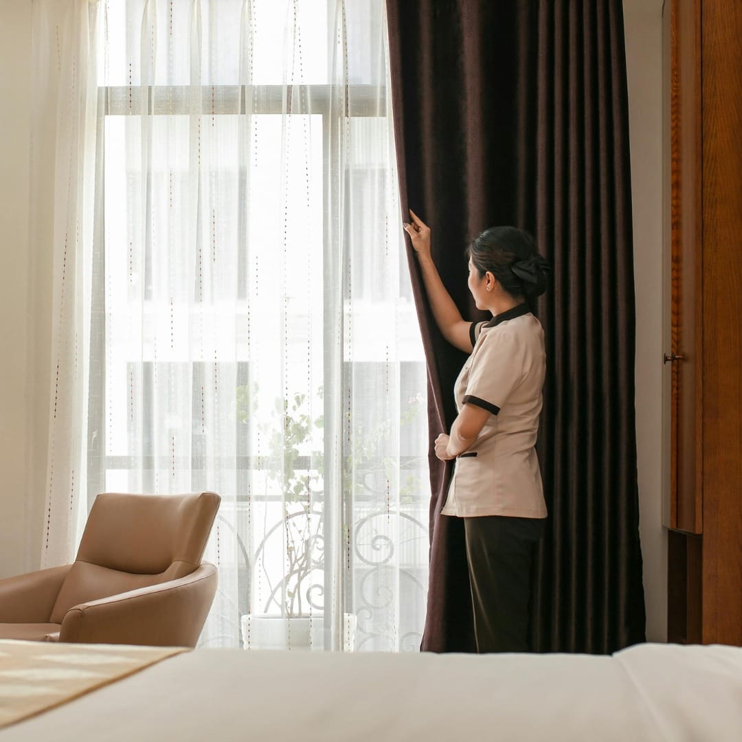 Layered sheer curtains with blackout drapery for bedroom privacy